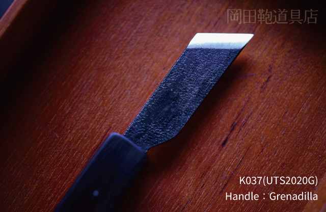 K037b