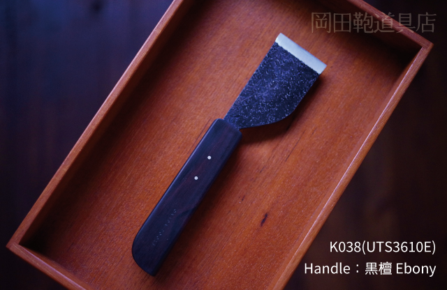 K038
